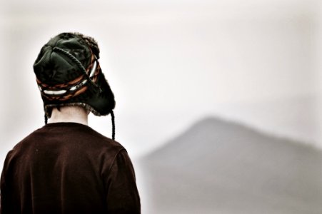 person wearing black chullo hat and black top photo