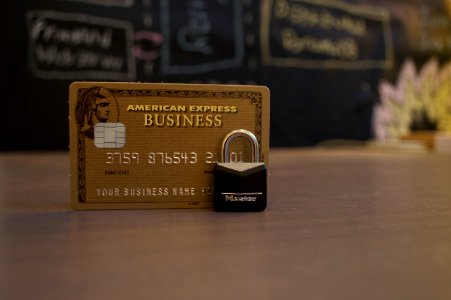 closeup photo of American Express Business card on brown surface photo