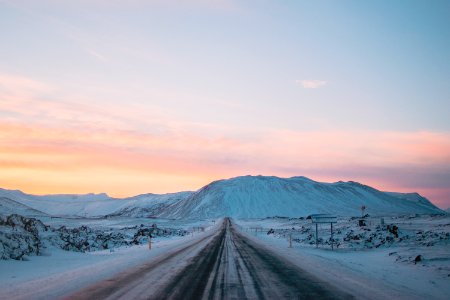 landscape photography of snow covered road and mountain photo