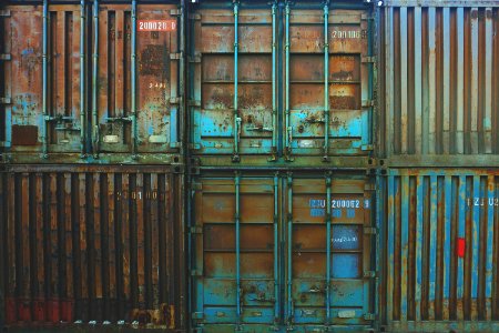 six blue freight containers photo