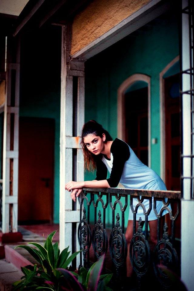 woman in white and black top outside
