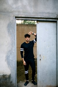 man standing in opened door