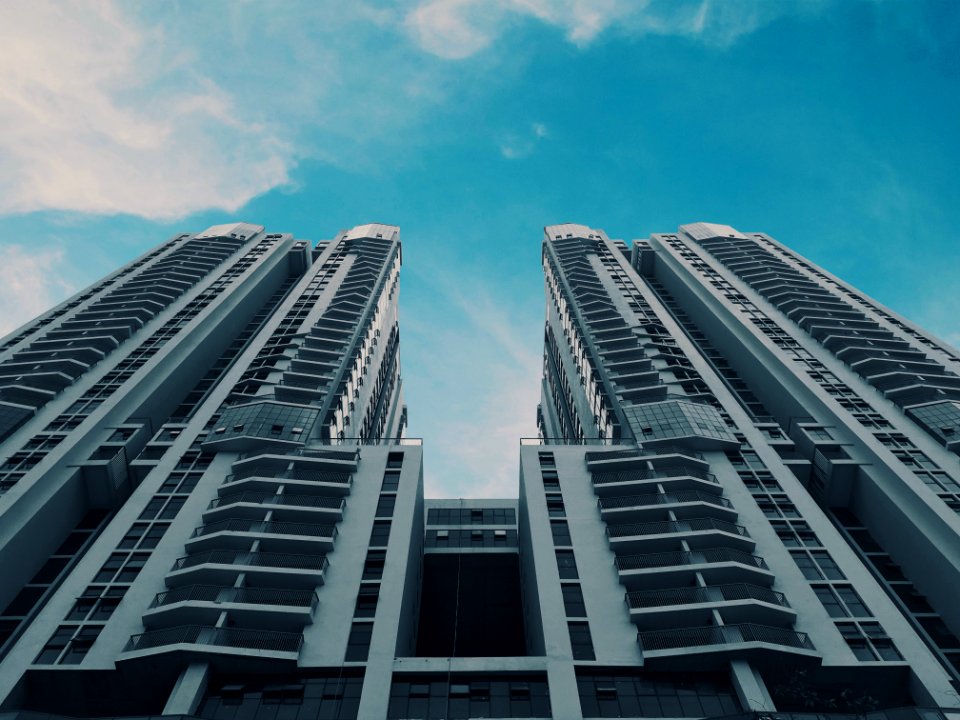 gray concrete building under blue sky at daytime