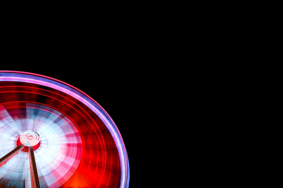 time lapse photography of ferris wheel during nighttime
