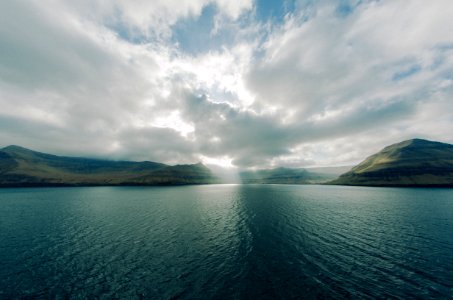 ocean under blue sky during daytime photo