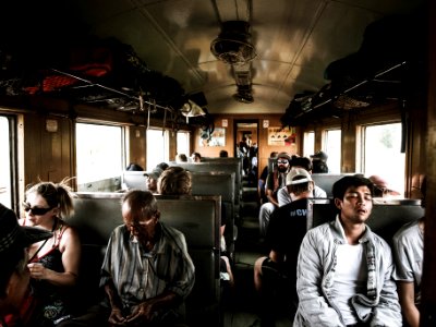 people sitting inside train photo