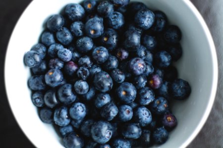 blueberries on white ceramic plate photo