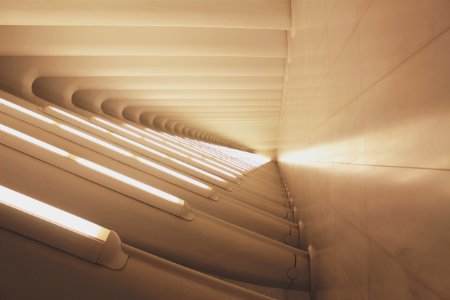 photo of white concrete hallway