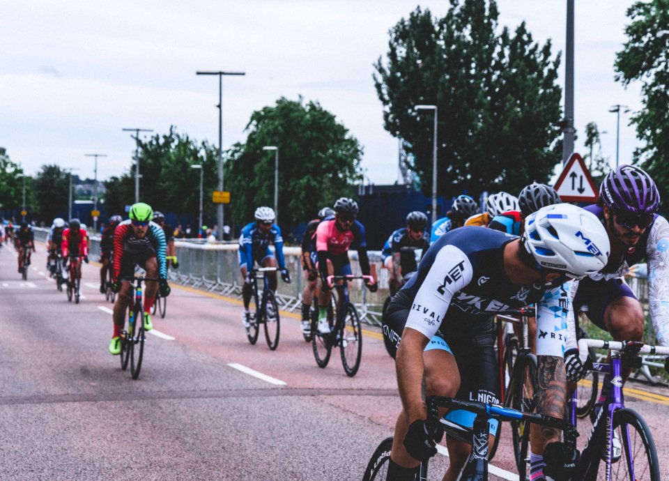 group of men riding bicycles photo