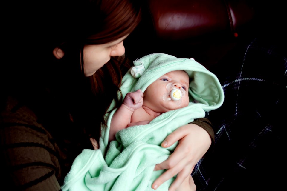 woman carrying baby