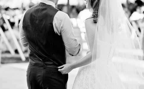 grayscale photography of bride and groom