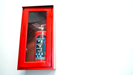 Fire extinguisher, White wall photo