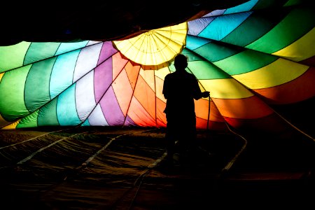 person holding parachute
