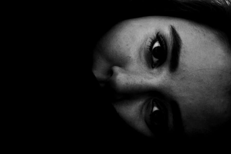 Black and white close up of horizontal female face in Tehran Province