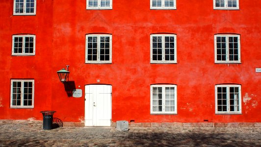 closeup photo of red concrete building