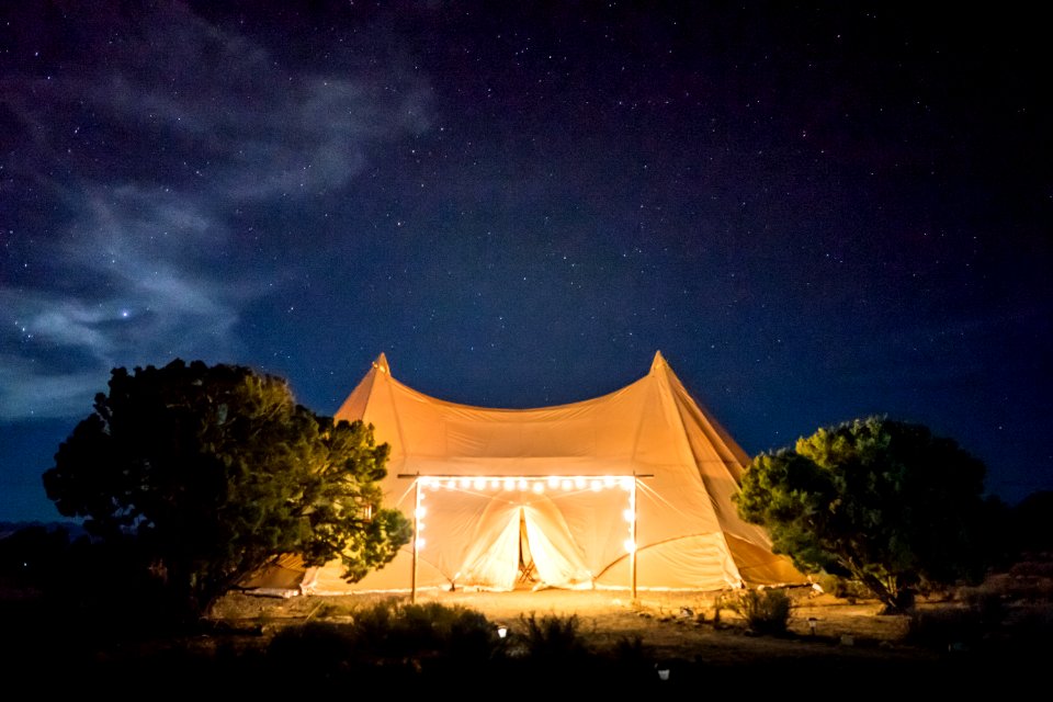 beige tent under starry skies