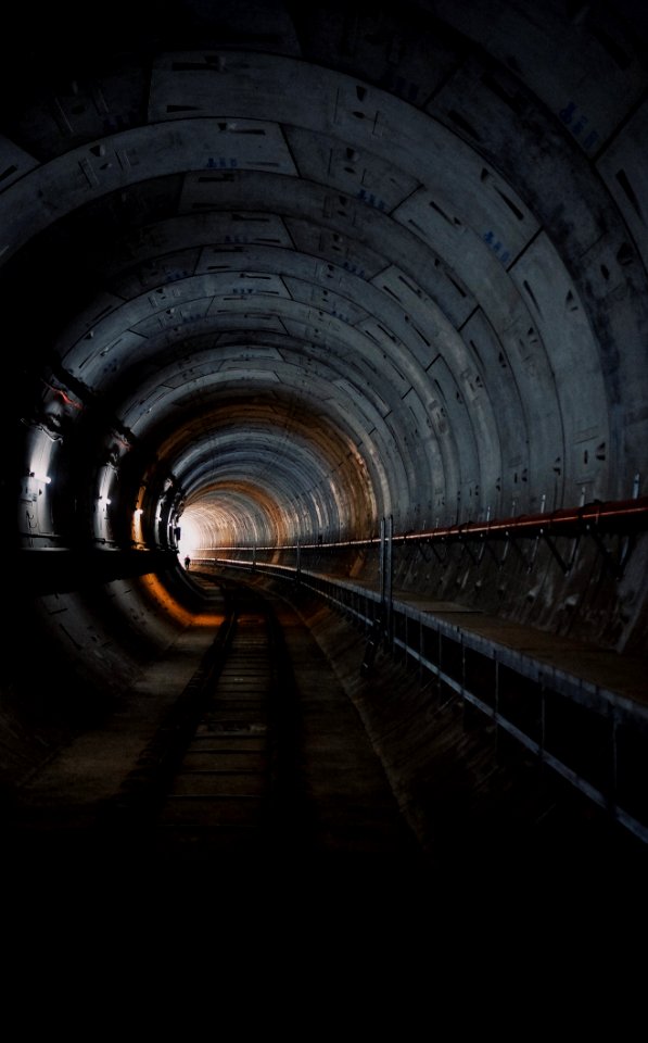 photo of train rail tunnel photo