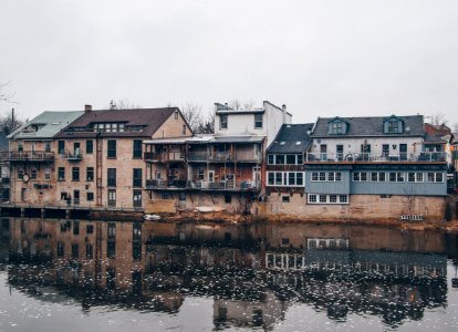 body of water near houses photo