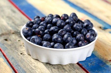 blueberries on white ceramic bowl photo