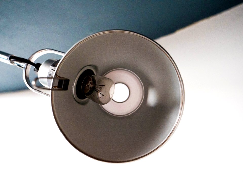 turned off white lamp with clear light bulb