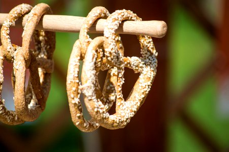 focus photo of four brown pretzels