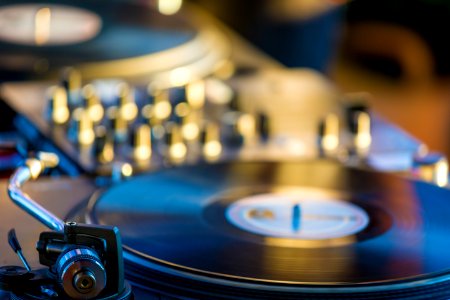selective focus photography of black vinyl player