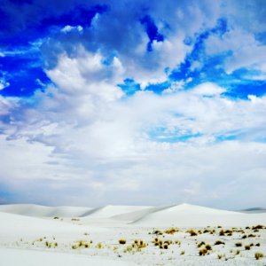 white desert field under the white cloud during daytime photo
