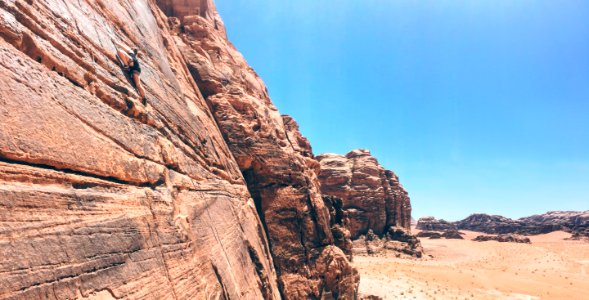 brown rock formation under blue sky during daytime photo