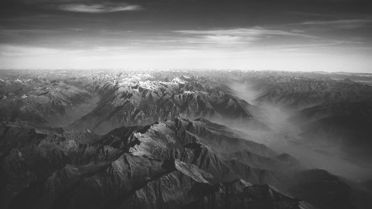 mountain range with cloudy sky photo