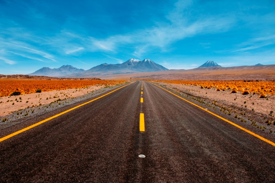 lone road going to mountains