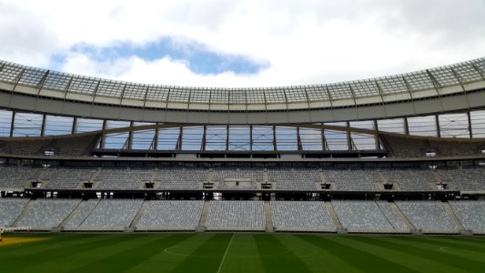 football stadium under cloudy sky photo