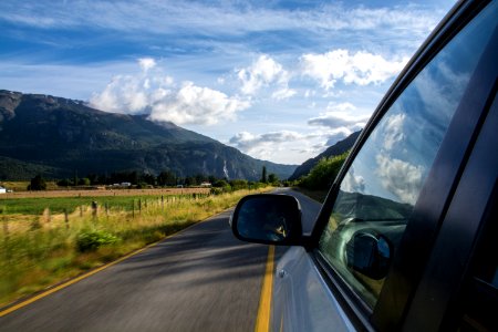 car on empty asphalt road photo