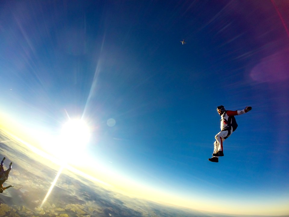 man jumping in sky during daytime