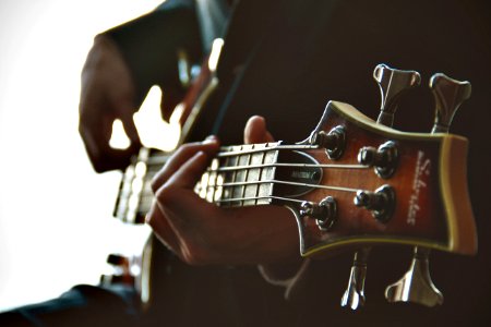 person playing guitar photo