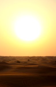 beige sand during sunset photo