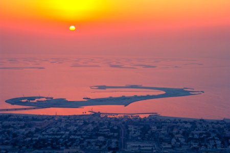 seaside city during sunset
