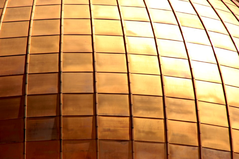 closeup photo of brass-colored wall