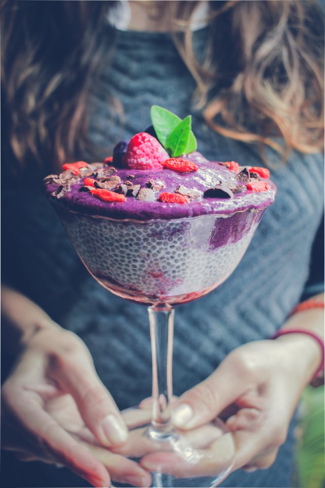 shaved ice with strawberry and blueberry toppings
