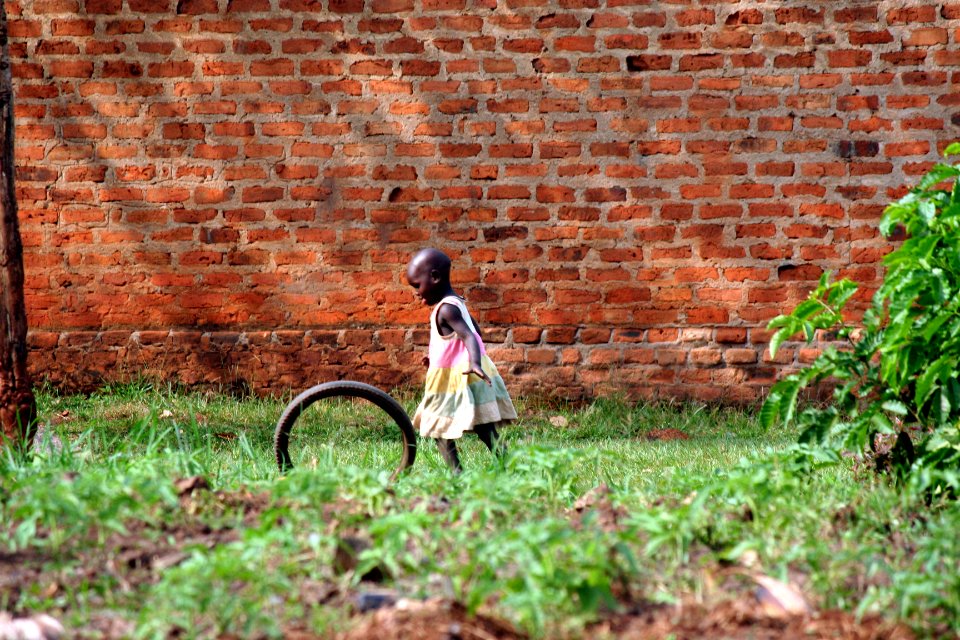 girl playing bike wheel
