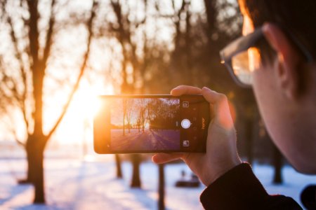 person holding black Android smartphone photo