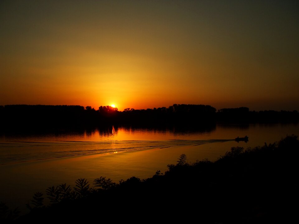 Twilight river boat