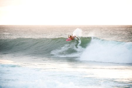 surfer on ocean wave during daytime photo