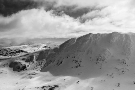 mountain covering white snow during daytime photo