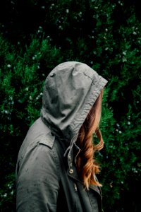 brown-haired woman wearing gray jacket