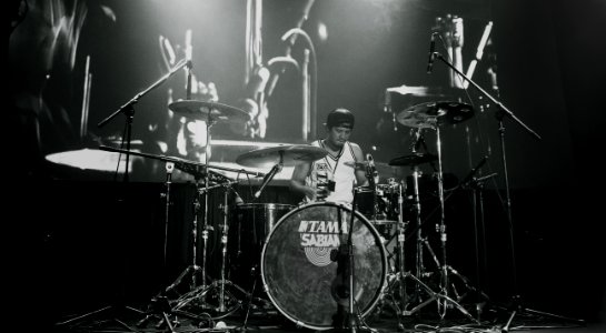 man playing drum set photo