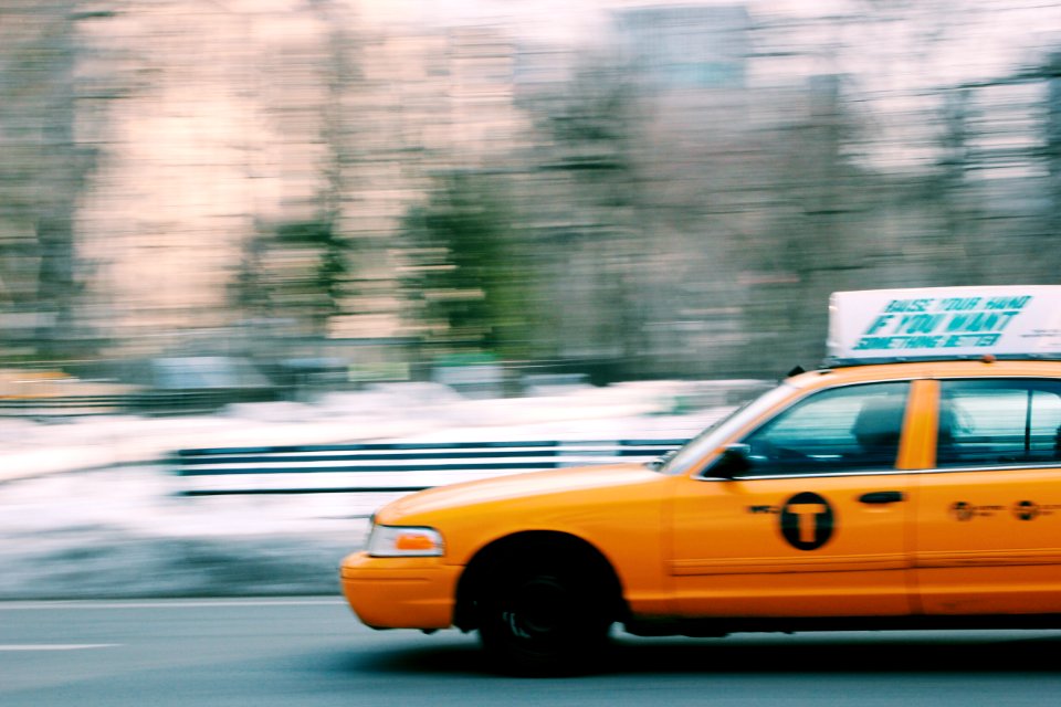 photo of yellow taxi photo