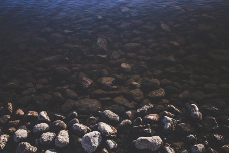 gray pebbles near river during daytime photo