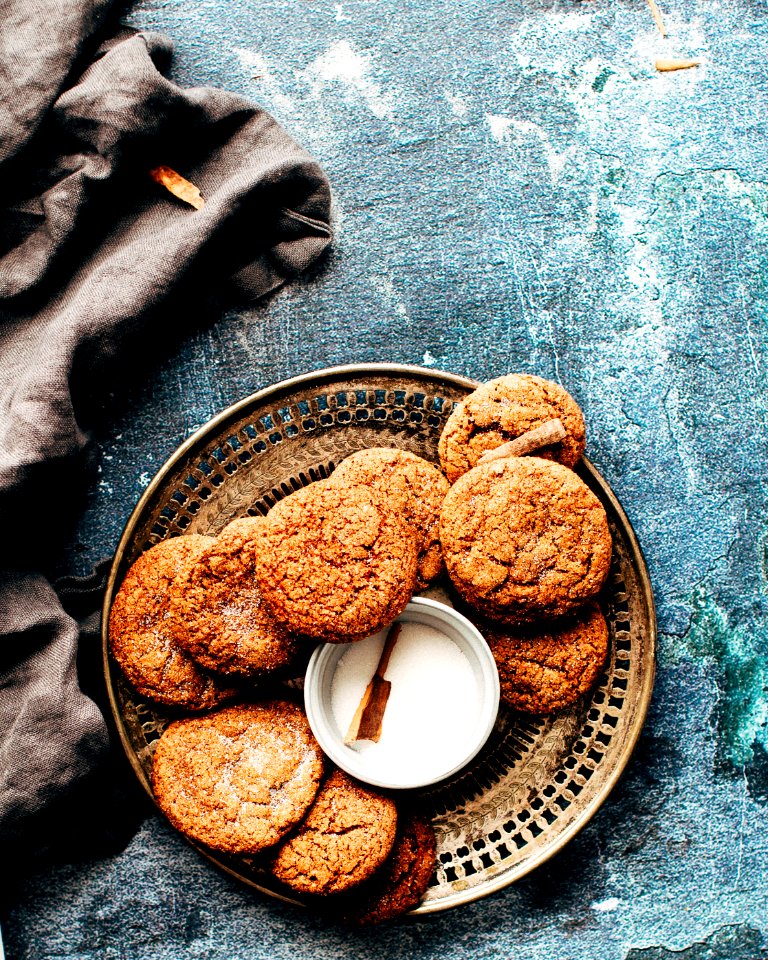 platter of cookies on top of blue surface