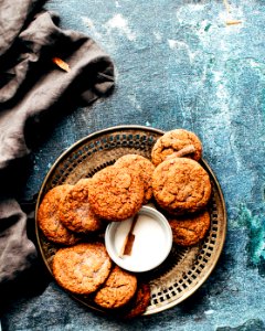 platter of cookies on top of blue surface
