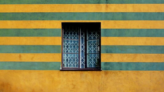 Colored townhouses glass shutters photo